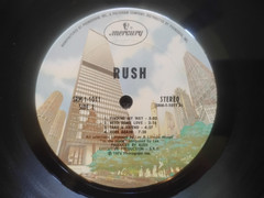 RUSH DEBUT ALBUM ORIGINAL 1974. PLAY TESTED NO SKIPS. TAPE REPAIR INNER SLEEVE.