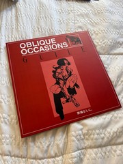 Oblique Occasions – Guile Red/Black Splatter Vinyl