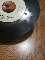 Johnny Winter – Voodoo Twist/Ease My Pain 45RPM Promo Vinyl Frolic White Label G