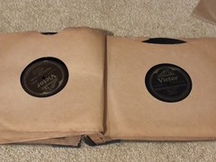 Lot of Nine (9) 78 rpm records in beautiful condition, in a book see list