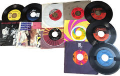 Collection of 10 45s plus Bonus groovy storage box