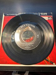 7 Tommy Dorsey songs on two 7″ RCA EP 45s in original color cardboard jackets