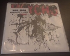 Psycho: S/T 2010 Patac Records 7″ Vinyl Sawblade Shaped Record Punk/ThrashVG+/EX