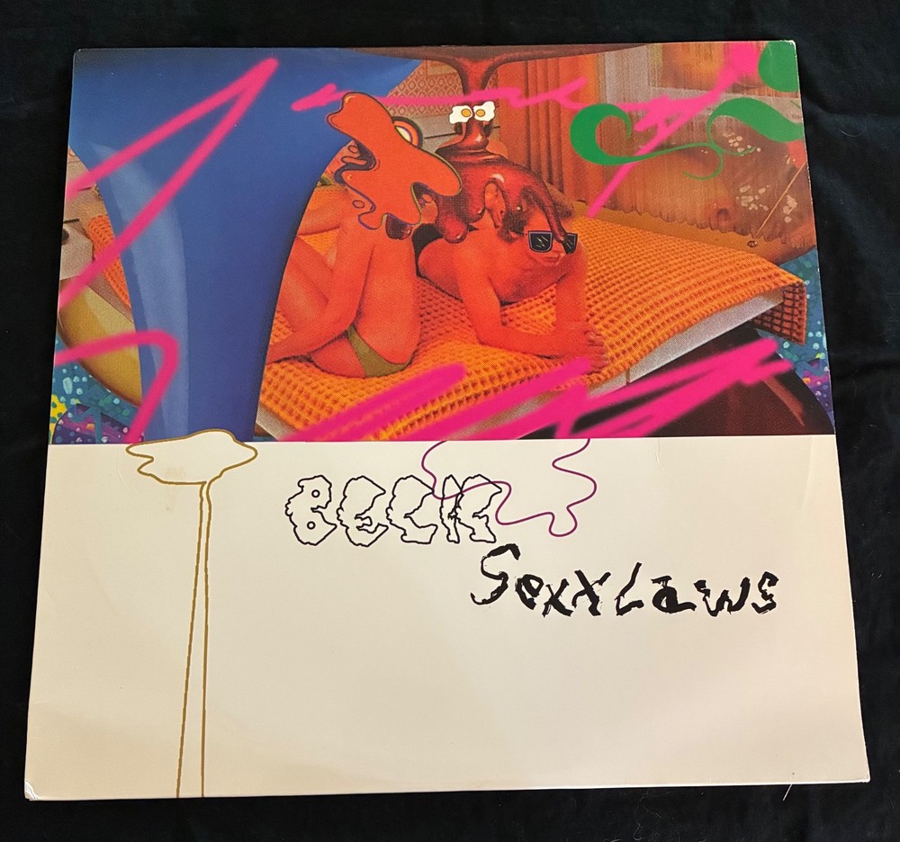 Beck – Sexx Laws – 1999 DGC – 0694971751 12 inch clear vinyl w/bonus flexi disc