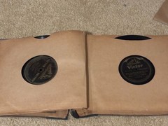 Lot of Nine (9) 78 rpm records in beautiful condition, in a book see list