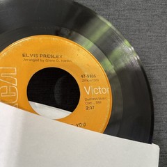 Elvis Presley-Lot of 11 different 45 RPM records in Excellent (EX) condition.