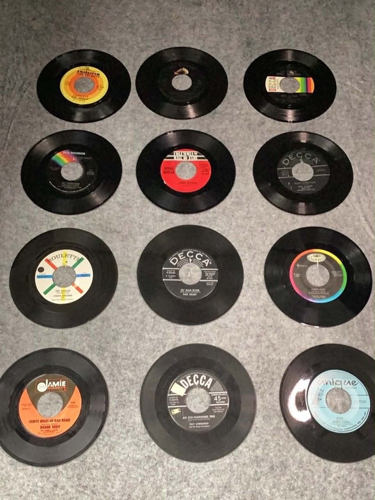 12 of 45 RPMs; 80’s, 90’s, 2000’s ERA; USED; GOOD CONDITION