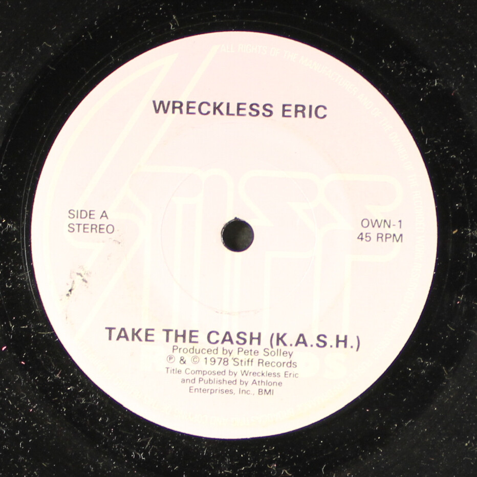 WRECKLESS ERIC: take the cash STIFF 7″ Single 45 RPM