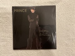 Prince – Welcome 2 America – limited edition 7″ gold vinyl #005528 SEALED COPY