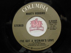 Marty Robbins – I’ve Got A Woman’s Love / Little Spot In Heaven, 45 RPM VG (23G)