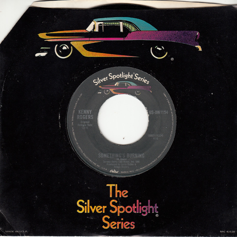 KENNY ROGERS/FIRST EDITION – SOMETHING’S BURNING – MINT REISSUE 45 – NEW