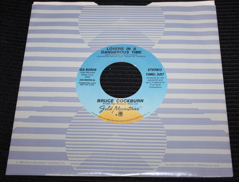 BRUCE COCKBURN – Lovers In A Dangerous Time (1984 U.S. Promo 7″ 45) NM Vinyl