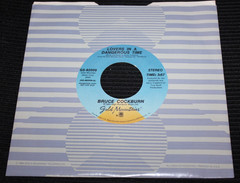 BRUCE COCKBURN – Lovers In A Dangerous Time (1984 U.S. Promo 7″ 45) NM Vinyl