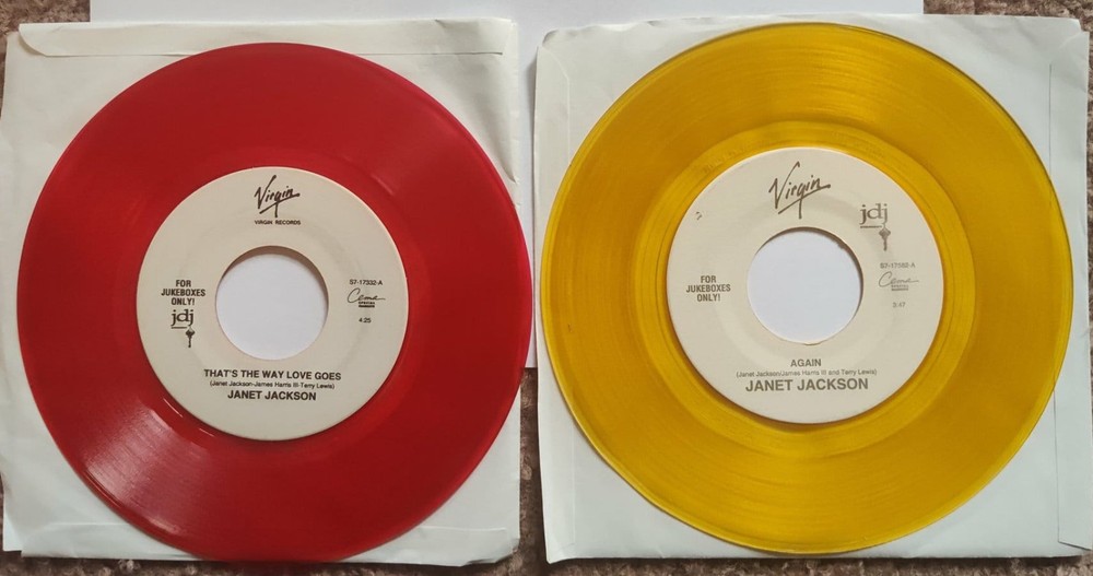 JANET JACKSON colored vinyl 7 inch singles. “That’s The Way Love Goes” & “Again”