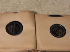 Lot of Nine (9) 78 rpm records in beautiful condition, in a book see list