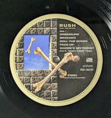 Rush – Roll The Bones (LP, Album, RE, RM, 180) (Mint (M)) – 4157654988