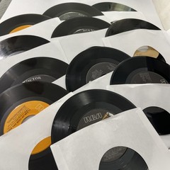 Elvis Presley-Lot of 11 different 45 RPM records in Excellent (EX) condition.