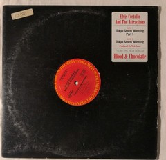 ELVIS COSTELLO: tokyo storm warning COLUMBIA 12″ Single 33 RPM EX