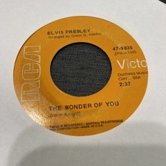 Elvis Presley-Lot of 11 different 45 RPM records in Excellent (EX) condition.