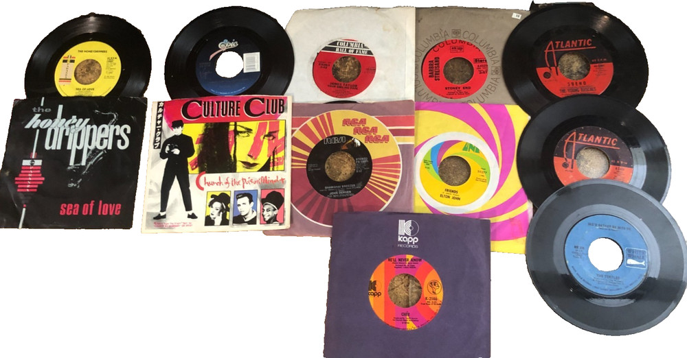 Collection of 10 45s plus Bonus groovy storage box