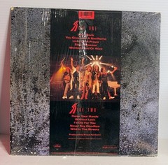 BON JOVI “SLIPPERY WHEN WET” 1986 LP Vinyl Record Heavy Metal Hype Sticker