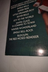 The Mistletoe Disco Band Christmas Disco Vinyl Records Holiday Party Time