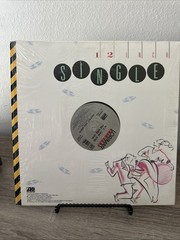 Vanity/MC Jam And Pee Wee Jam UNDRESS/PROTECT AND SERVE Lorimar 12″ Single VG+
