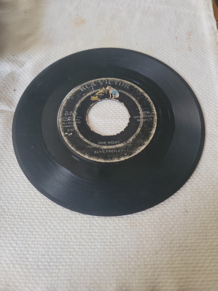 Vintage 7-inch 45 RpM Vinyl Record Featuring Elvis Presley’s Sons “One Night”…