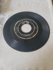 Vintage 7-inch 45 RpM Vinyl Record Featuring Elvis Presley’s Sons “One Night”…