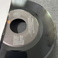 Elvis Presley-Lot of 11 different 45 RPM records in Excellent (EX) condition.