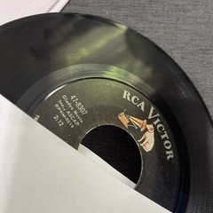 Elvis Presley-Lot of 11 different 45 RPM records in Excellent (EX) condition.