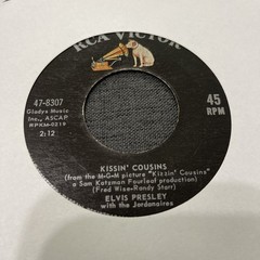 Elvis Presley-Lot of 11 different 45 RPM records in Excellent (EX) condition.