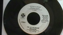 The Lee Holdridge Orchestra – Victory Is Peace / Snow Frolic 7″ 45 rpm VG+