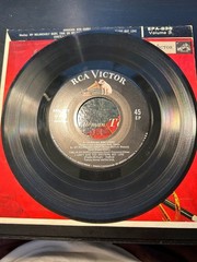 7 Tommy Dorsey songs on two 7″ RCA EP 45s in original color cardboard jackets