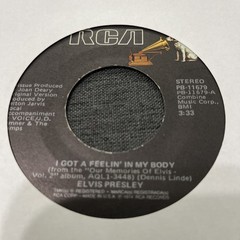 Elvis Presley-Lot of 11 different 45 RPM records in Excellent (EX) condition.