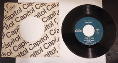 vintage 7-inch 45 RPM vinyl single of the 1952 comedy “It’s in the Book”