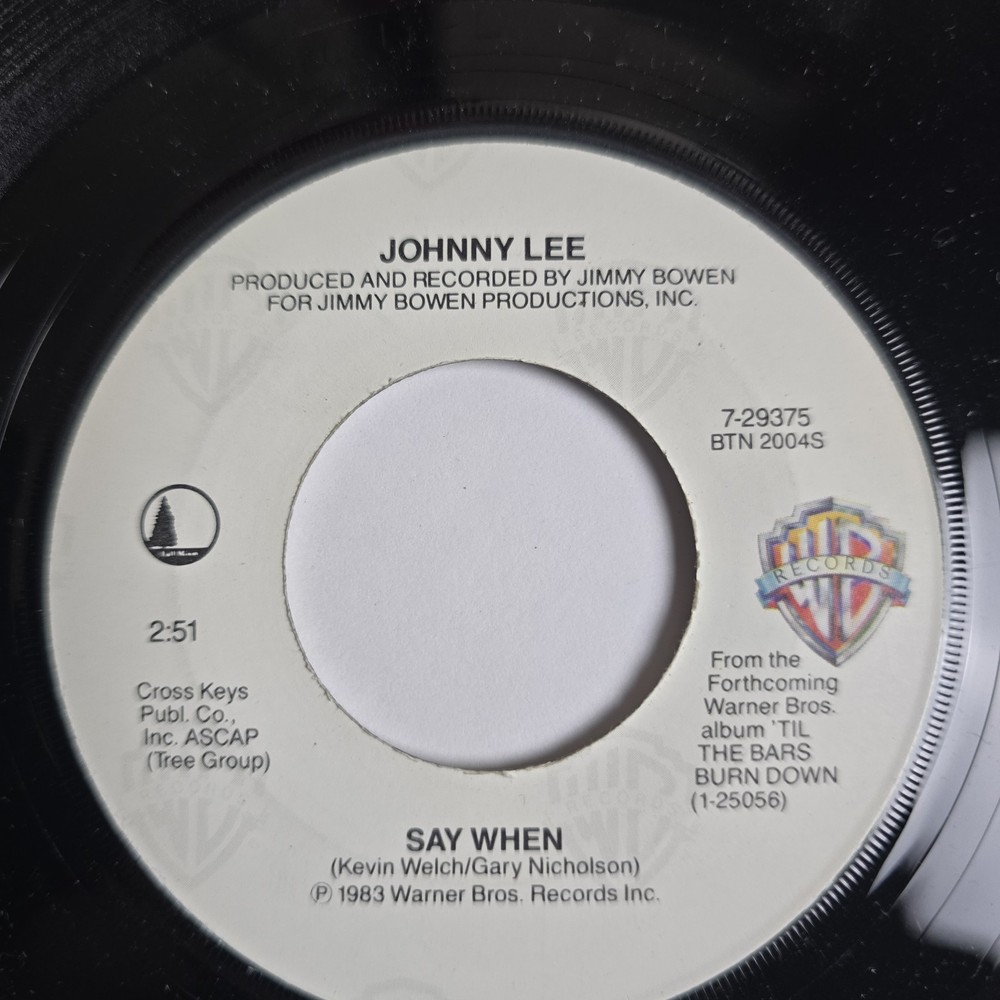 Johnny Lee Say When/ The Yellow Rose Warner Bros. 45 RPM Record 7-29375