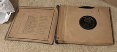 Lot of Nine (9) 78 rpm records in beautiful condition, in a book see list