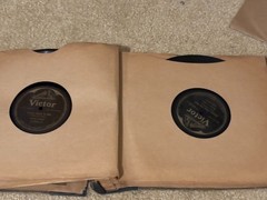 Lot of Nine (9) 78 rpm records in beautiful condition, in a book see list