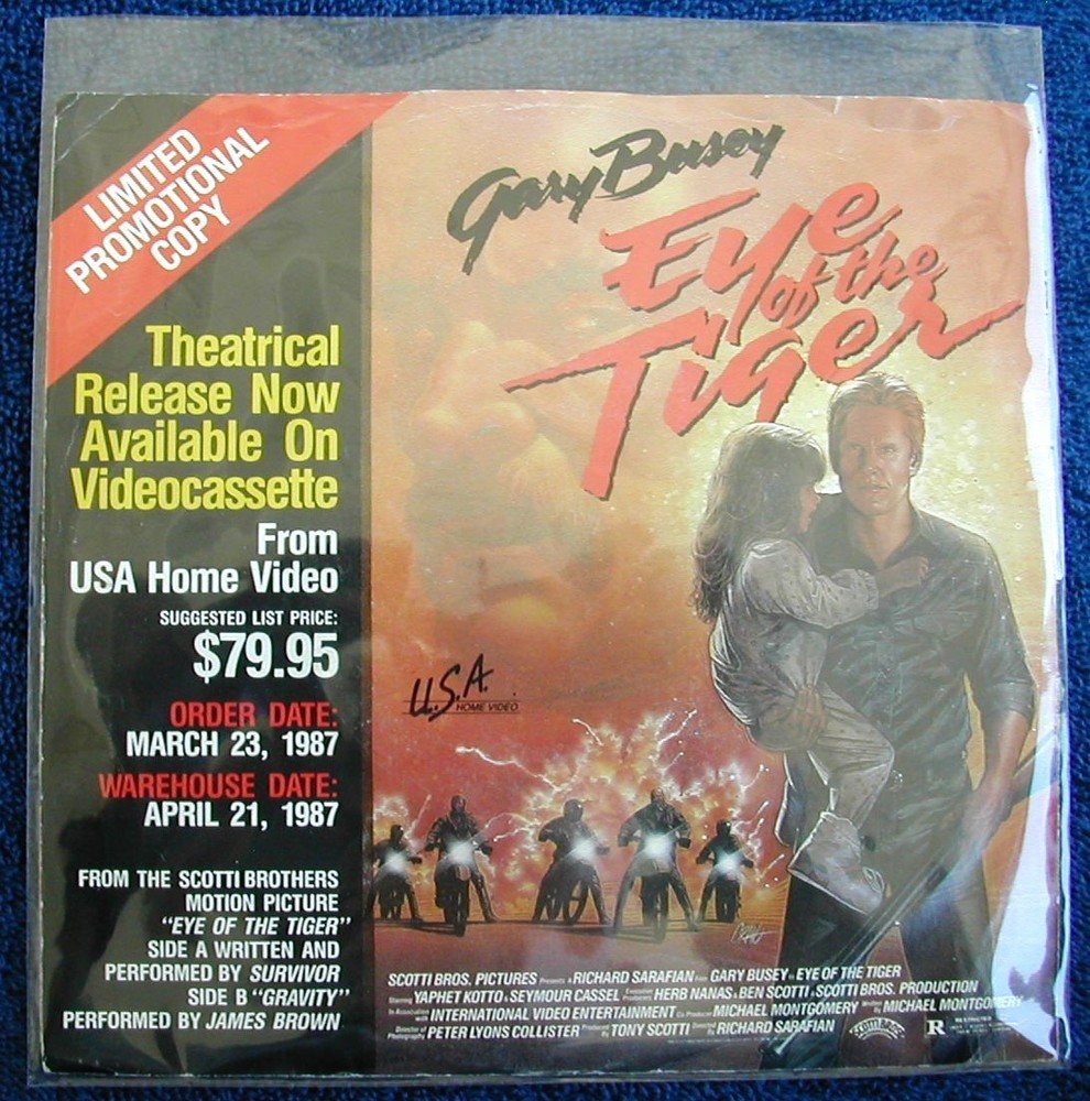 1987 “Eye of the Tiger” PROMO Movie 45 Gary Busey SURVIVOR Vinyl EXCELLENT!