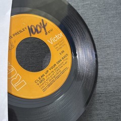 Elvis Presley-Lot of 11 different 45 RPM records in Excellent (EX) condition.