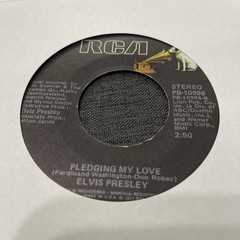 Elvis Presley-Lot of 11 different 45 RPM records in Excellent (EX) condition.