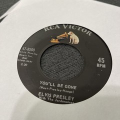 Elvis Presley-Lot of 11 different 45 RPM records in Excellent (EX) condition.